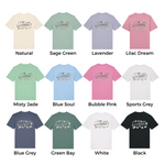 Collection of t-shirts in various colors with text labels on a white background